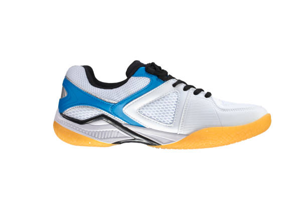 istock White sneaker with blue stripes on a white background. Sport shoes. 1197142296