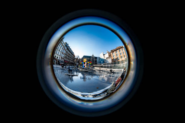 2019 Fish-eye image of the pool opposite the Pompidou Centre 2019 Fish-eye image of the pool opposite the Pompidou Centre Paris, France with reflections of the modern sculptures in the pool. pompidou center stock pictures, royalty-free photos & images