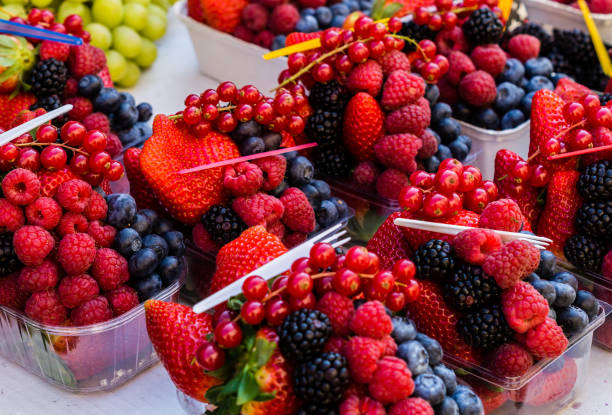 istock Red berries mix on the market 1197148931