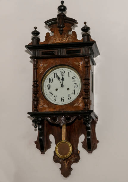 istock Vintage wooden clock with a pendulum 1197150315