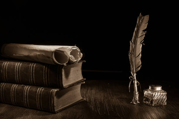 istock QUIll pen and old books 1197152976