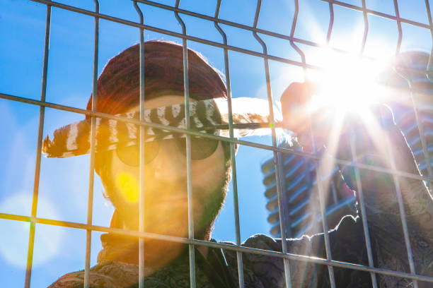 istock Sacred man with feather under city sun 1197153066