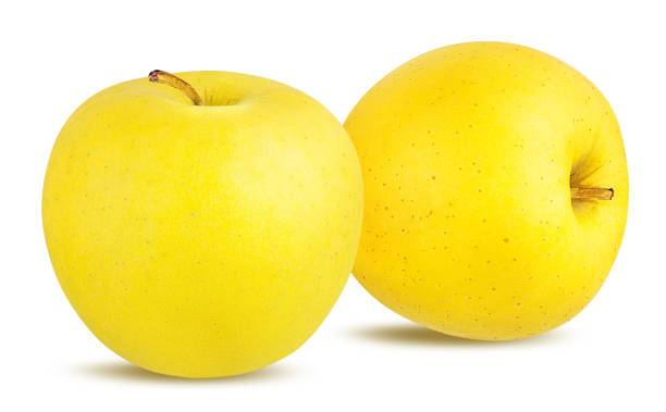 istock Yellow apples isolated on white background with clipping path 1197154200