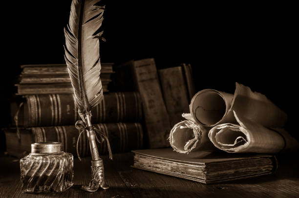 istock QUIll pen and old books 1197154226