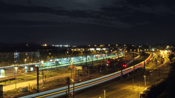 istock Long exposure of a train station at night 1197154548