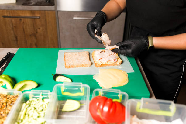 istock Process of making toast with ham and cheese in a restaurant kitchen 1197155420
