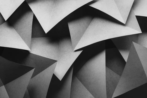 istock Geometric shapes made paper, dark background 1197158316