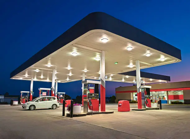 Horizontal shot of a gasoline station and convenience store REWORKED.