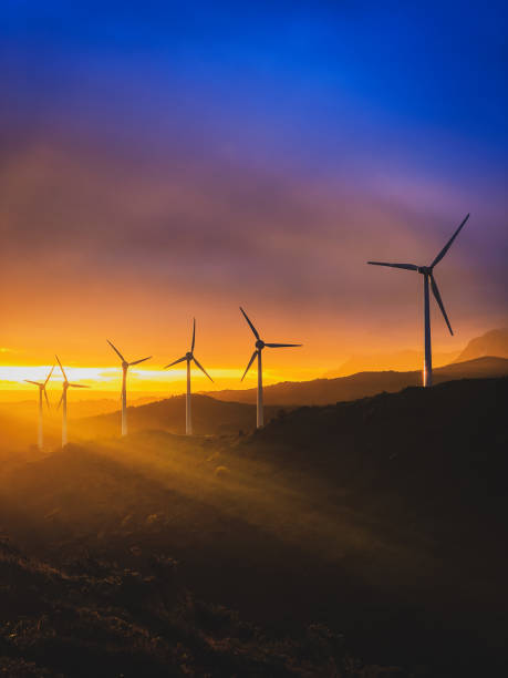 Win farm. Wind farm in Navarre (Spain) at sunset. Renewable energy concept. windmill sunset stock pictures, royalty-free photos & images