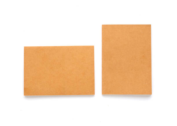 istock Colorful Kraft Notebook in white background 1197161070