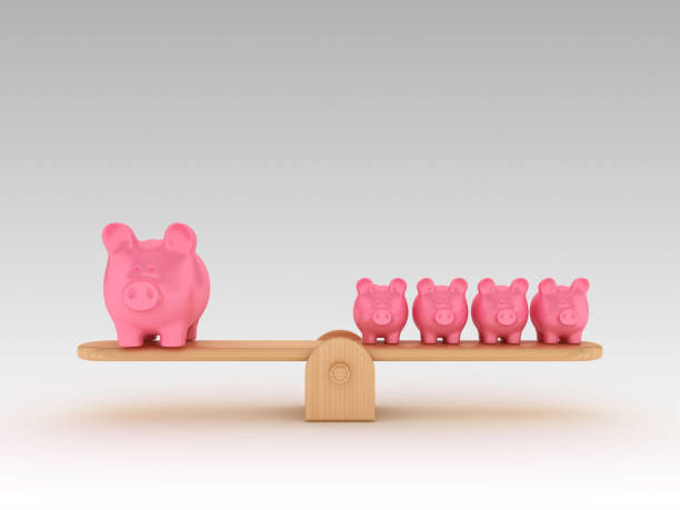 istock Seesaw Scale with Piggy Banks - 3D Rendering 1197162295