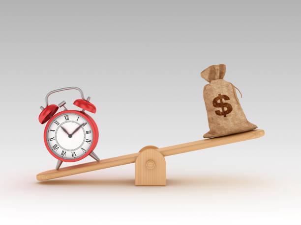 istock Seesaw Scale with Dollar Money Sack and Clock - 3D Rendering 1197162323