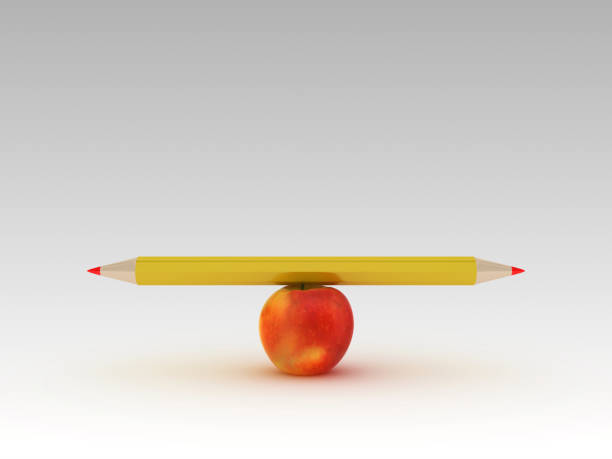 istock Seesaw Scale with Pencil and Apple - 3D Rendering 1197163204
