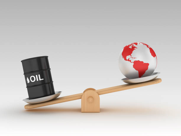 istock Seesaw Scale with Oil Tank and Globe World - 3D Rendering 1197163330