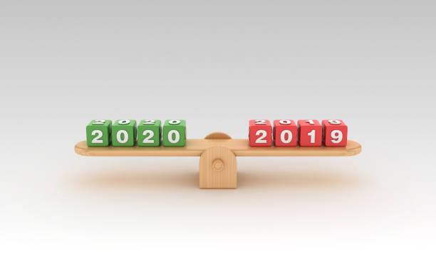 istock Seesaw with 2020 2019 Buzzword Cubes - 3D Rendering 1197164546