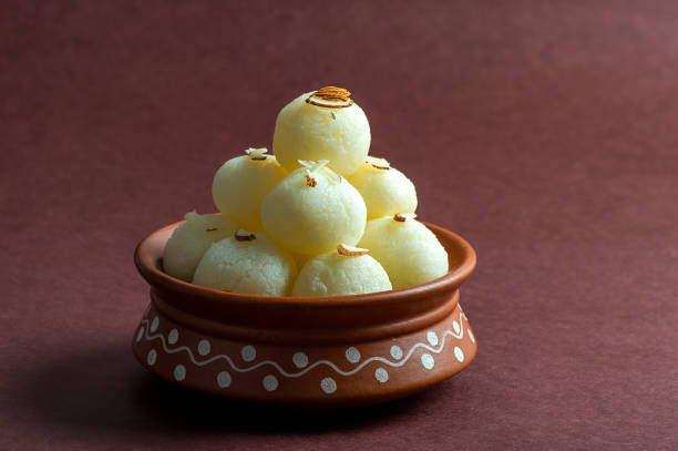istock Indian Sweet - Rasgulla in clay pot 1197164937