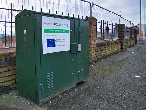 A BT Superfast Broadband cabinet, showing support from the EU Regional Development fund - located next to the site of the Wirral Waters development in Birkenhead, Wirral