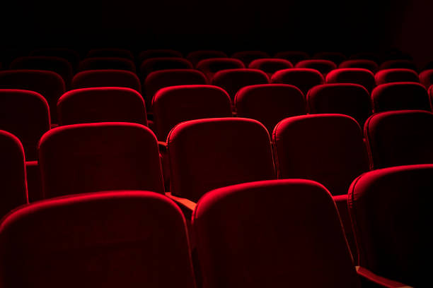 istock Cinema / theater red seats background 1197165736