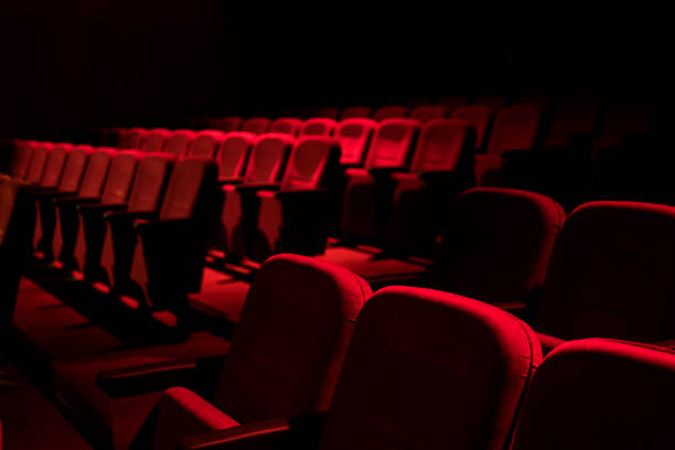 istock Cinema / theater red seats background 1197165751
