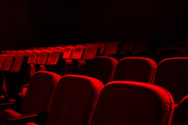 cinema / theater red seats background - empty theater imagens e fotografias de stock