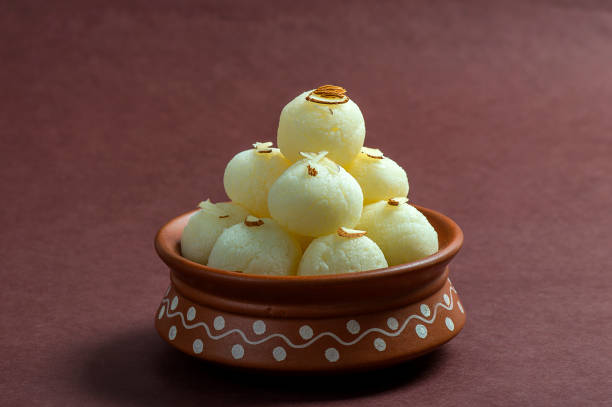 istock Indian Sweet - Rasgulla in clay pot 1197165935