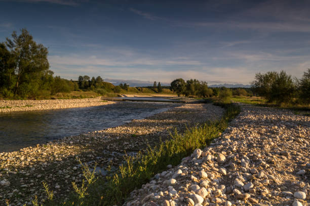 istock View of the Czarny Dunajec river and distant mountains. 1197166111