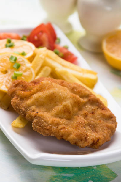 istock Breaded cutlet with french fries 1197167110