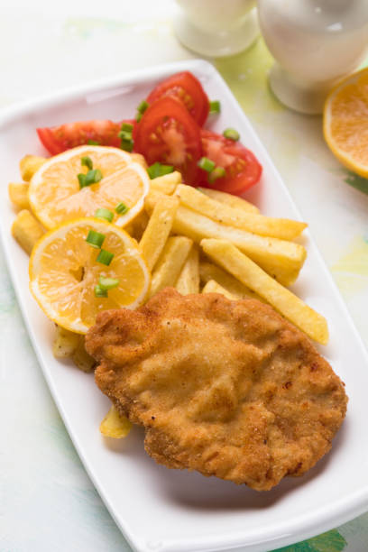 istock Breaded cutlet with french fries 1197167149