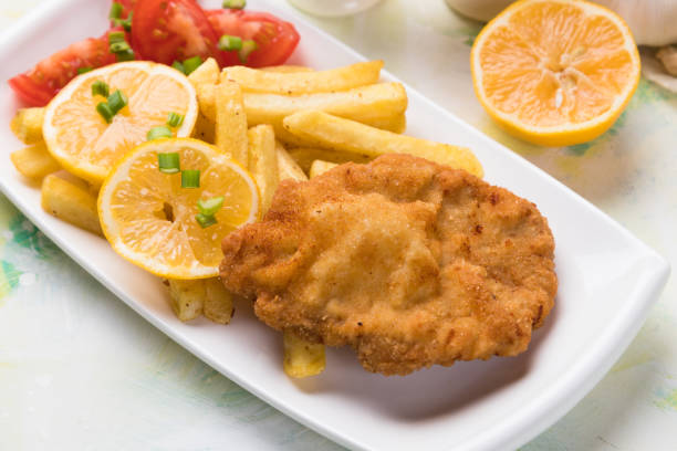 istock Breaded cutlet with french fries 1197167183