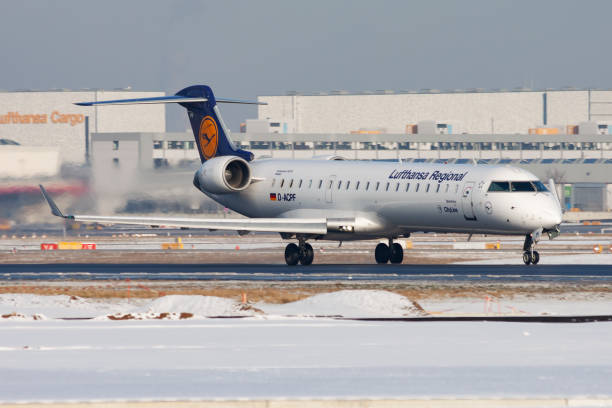 Lufthansa Bombardier CRJ-700 D-ACPF passenger plane departure at Frankfurt Airport 2012: Lufthansa Bombardier CRJ-700 D-ACPF passenger plane departure at Frankfurt Airport bombardier crj stock pictures, royalty-free photos & images