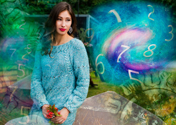 istock Beautiful woman numerology and time 1197169064