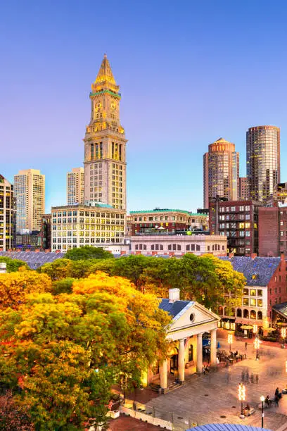 Photo of Boston, Massachusetts, USA skyline with Faneuil Hall and Quincy Market