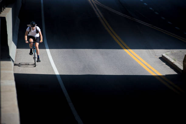 istock Bicycle Messenger rides Bike Lane 1197170542