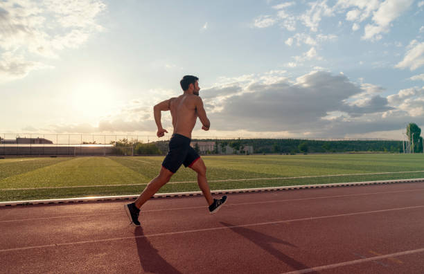 istock young male athlete is running 1197172328