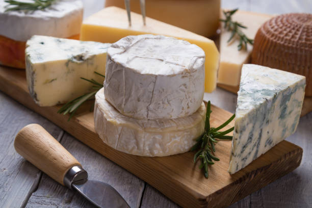 istock Aged cheese round and slices 1197174625
