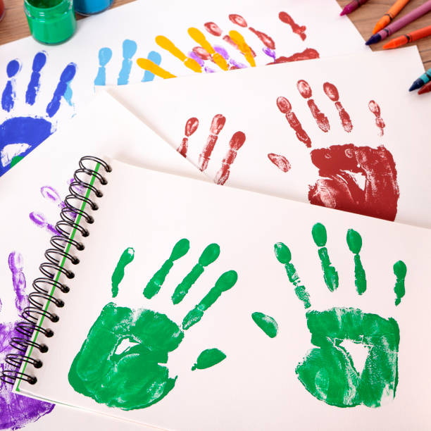 istock Handprints and art equipment 1197177899