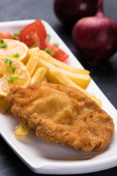 istock Breaded cutlet with french fries 1197179963