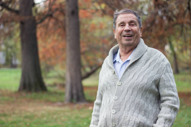 istock Portrait of senior man smiling 1197183347
