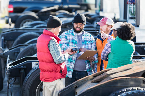 istock Workers at trucking company having meeting 1197185755