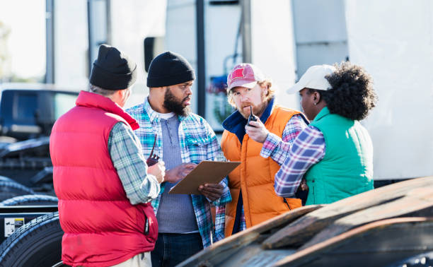 istock Workers at trucking company having meeting 1197186295