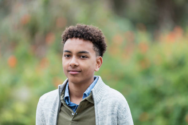 istock Confident mixed race boy at a park 1197187853
