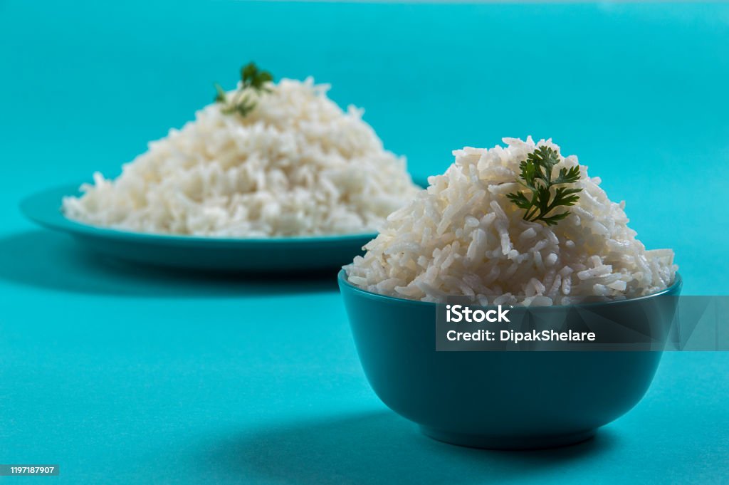 Cooked Rice Blue Cooked Plain White Basmati Rice In A Blue Plate And Bowl On Blue ...