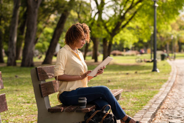 istock Young woman in Argentina working on her digital tablet 1197188172