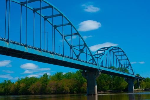 Steel Arch bridge spanning the Missouri River at Leavenworth KS
