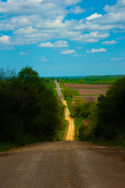 istock twisty rural dirt road 1197190098