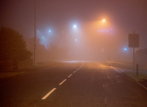 istock Empty street on foggy night 1197192146