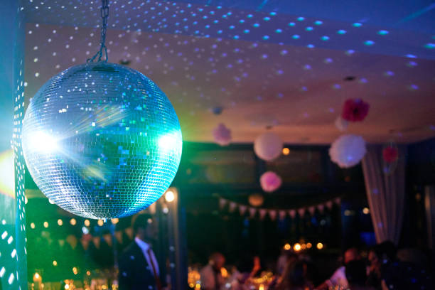 istock nightclub disco ball with colorful reflections 1197197912