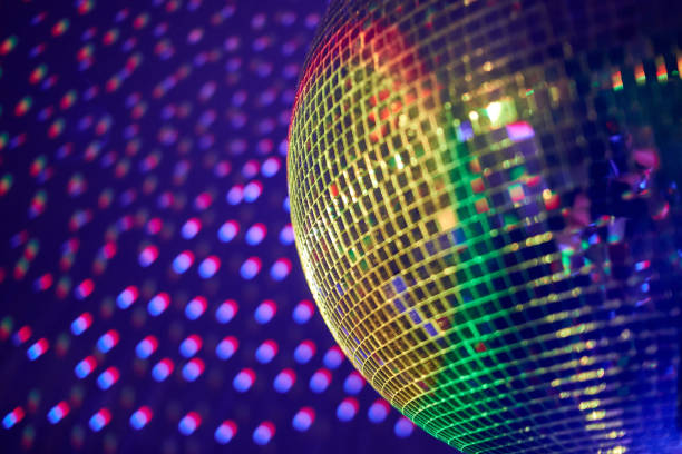 istock nightclub disco ball with colorful reflections 1197197982