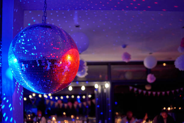 istock nightclub disco ball with colorful reflections 1197198096