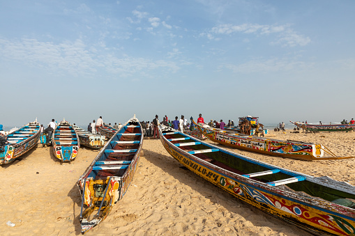 Traditional painted wooden fishing boat in Kayar, Senegal. West Africa.